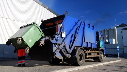 Segregated recycling containers at a business premises in Cranford