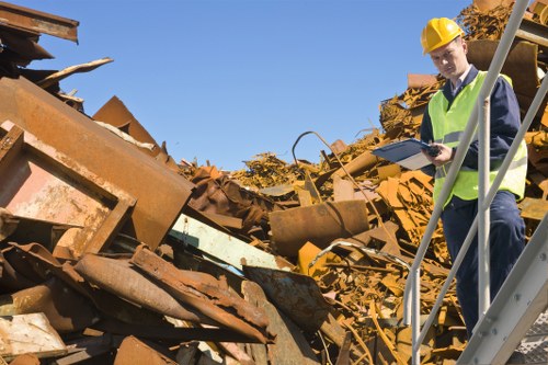 Supervisor reviewing a printed risk assessment on site